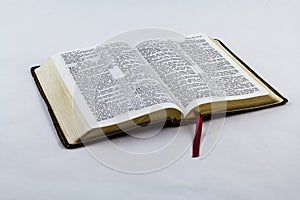 Open Bible on White Background