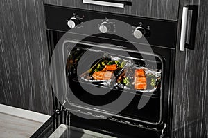 Open black built-in convection oven in the kitchen.