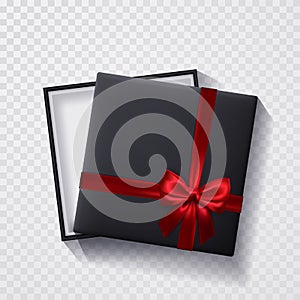 Open black empty gift box with red bow and ribbon on transparent background. Top view. Template for your presentation, banner or