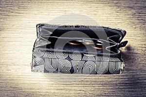 Open black woman wallet with money and id cards