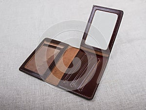 Open blank cover; brown leather case