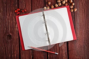 Open blank notepad with a pencil