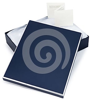 Open blue gift box with note isolated on white background