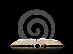 Open book, black background