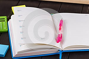 Open book on blackboard