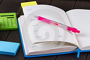 Open book on blackboard