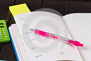 Open book on blackboard