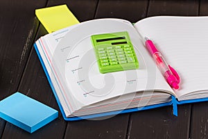 Open book on blackboard