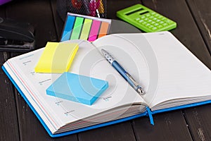 Open book on blackboard