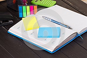 Open book on blackboard