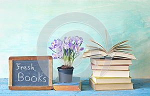 Open book and and blackboard fresh books for 2018