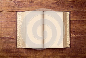 Open Book blank on old wood background