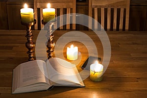 Open book and candles