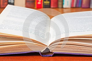 Open book on the desk close-up