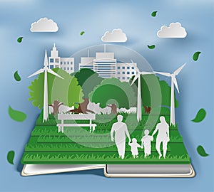 Open book with eco composition in paper art style of family in park on green town shape.