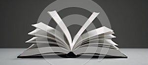 An open book floats amidst scattered flying pages against a soft gray backdrop