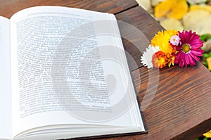 Open book and flowers