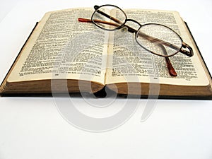 Open book and glasses