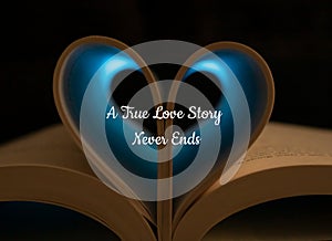 Open Book with Heart Shaped Pages with Blue Light Shining Through, Love Quote