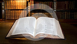 Open book in old library