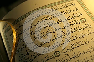 Open book pages of Holy koran photo