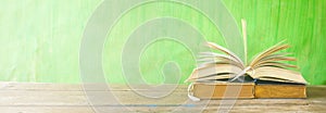 Open book, reading, learning, education concept, panorama format photo