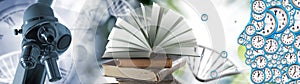 An open book symbolizing the source of knowledge. A book lying on a stack of books