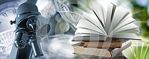 An open book symbolizing the source of knowledge. A book lying on a stack of books