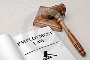 Open book with words EMPLOYMENT LAW