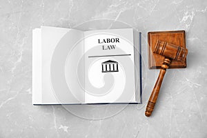 Open book with words LABOR LAW and gavel