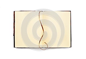 Open book with yellow pages and bookmark. Isolated. Vintage Top view