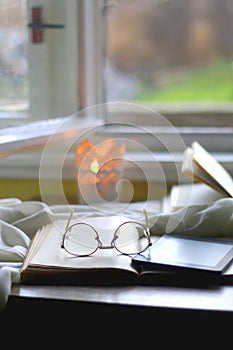 Books, Reading Glasses and E-Reader