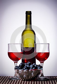 Bottle of red wine and wine glasses