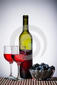 Bottle of red wine and wine glasses