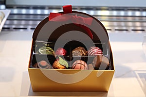 Open box of chocolates photo