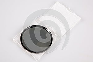 Open box of a circular polarizer filter neutral density on a white background