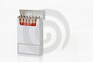 Open box with sharpened pencils