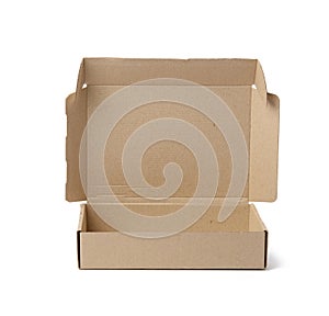 Open brown cardboard paper box isolated on white background