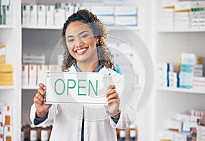 Open, business sign and woman portrait in a pharmacy with billboard from medical work. Working, pharmacist and