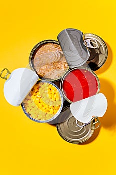 Open canned tuna, sweet corn and tomato sauce.