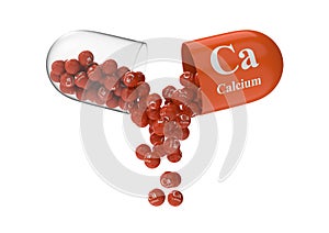 Open capsule with calcium from which the vitamin composition is pouring photo