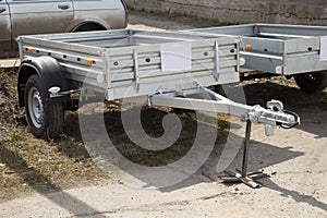 Open car trailer. Trailer for passenger cars.Sale, rental and maintenance of trailers