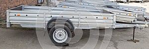 Open car trailer. Trailer for passenger cars.Sale, rental and maintenance of trailers