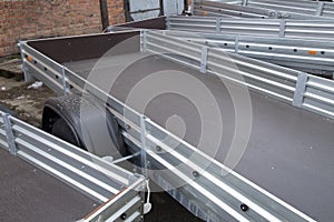 Open car trailer. Trailer for passenger cars.Sale, rental and maintenance of trailers