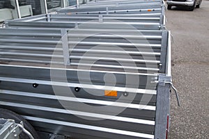 Open car trailer. Trailer for passenger cars.Sale, rental and maintenance of trailers