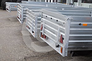 Open car trailer. Trailer for passenger cars.Sale, rental and maintenance of trailers