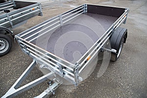 Open car trailer. Trailer for passenger cars.Sale, rental and maintenance of trailers