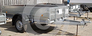 Open car trailer. Trailer for passenger cars.Sale, rental and maintenance of trailers