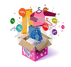 Open cardboard box with children`s clothing and confetti explosion inside and on white background