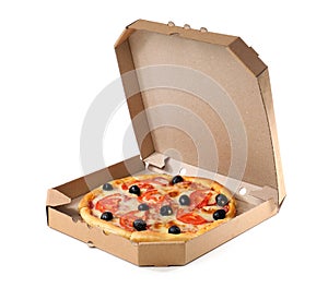 Open cardboard box with delicious pizza on white background.